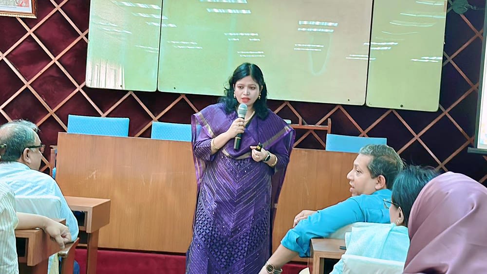 Dr Tasrina Rabia Chodhury presents her research at a conference in Bangladesh.