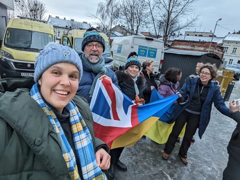 Recently, Maria (far left) traveled to Lviv with Medical Life Lines Ukraine(opens in new tab/window), where they delivered decommissioned NHS ambulances full of humanitarian aid including food and emergency medical supplies.